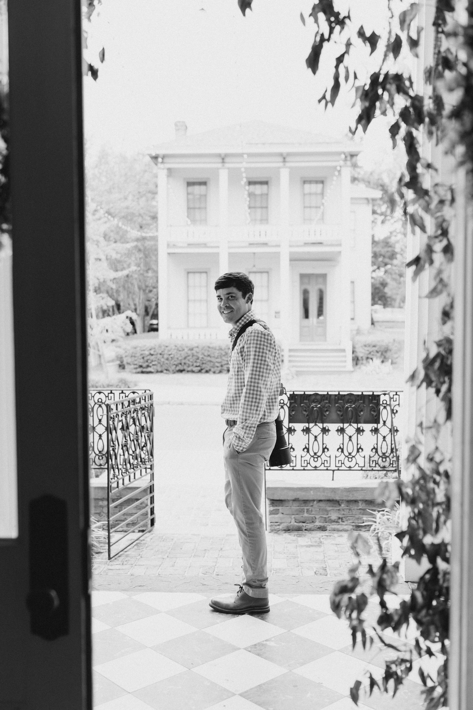 photo of artist Brandon Finnorn standing in doorway at Fort Conde Inn in Mobile Alabama