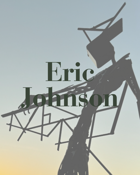 eric johnson sculpture with text overlay