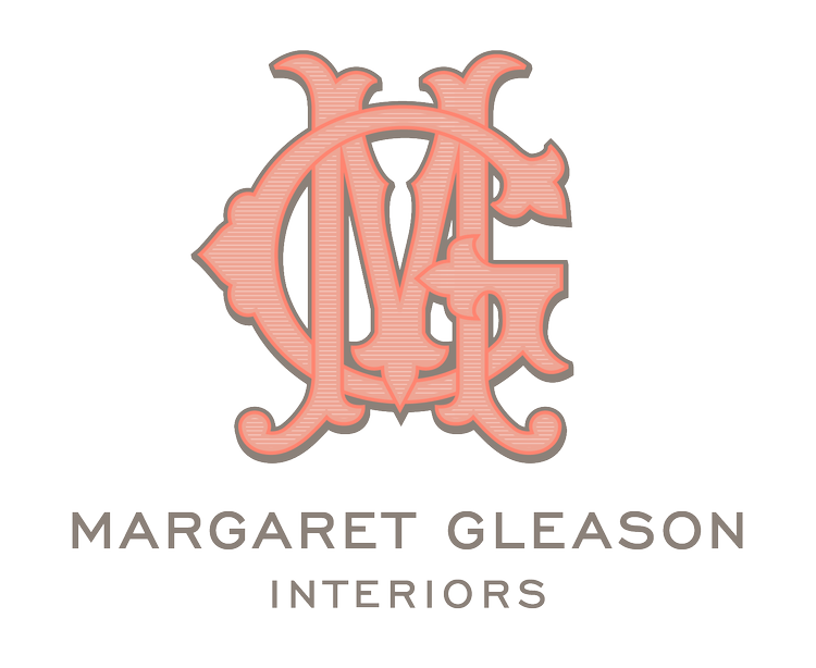 Logo of Margaret Gleason Interiors with decorative initials on a white background