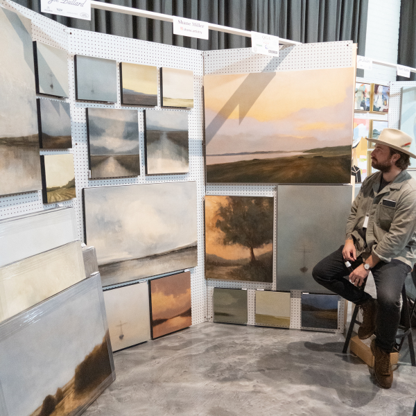 shane miller at his booth at the loyola art show 2024