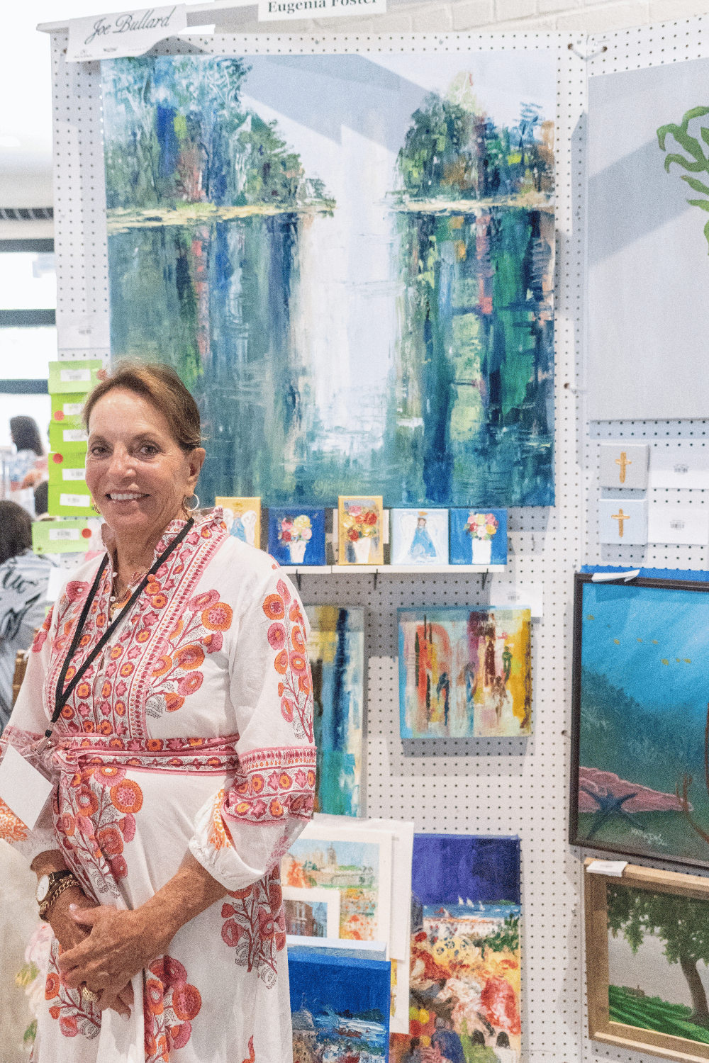 artist eugene foster at her booth at the loyola art show in mobile alabama