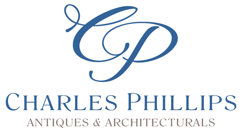 Charles Phillips Antiques & Architecturals logo featuring a blue stylized 'CP' monogram above the text 'CHARLES PHILLIPS' in blue and 'ANTIQUESS & ARCHITECTURALS' in taupe on a white background.