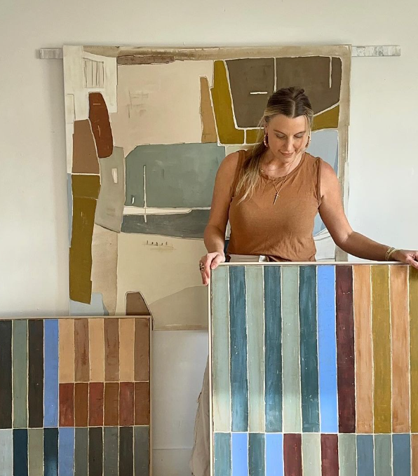 sarah ella cole with three of her paintings