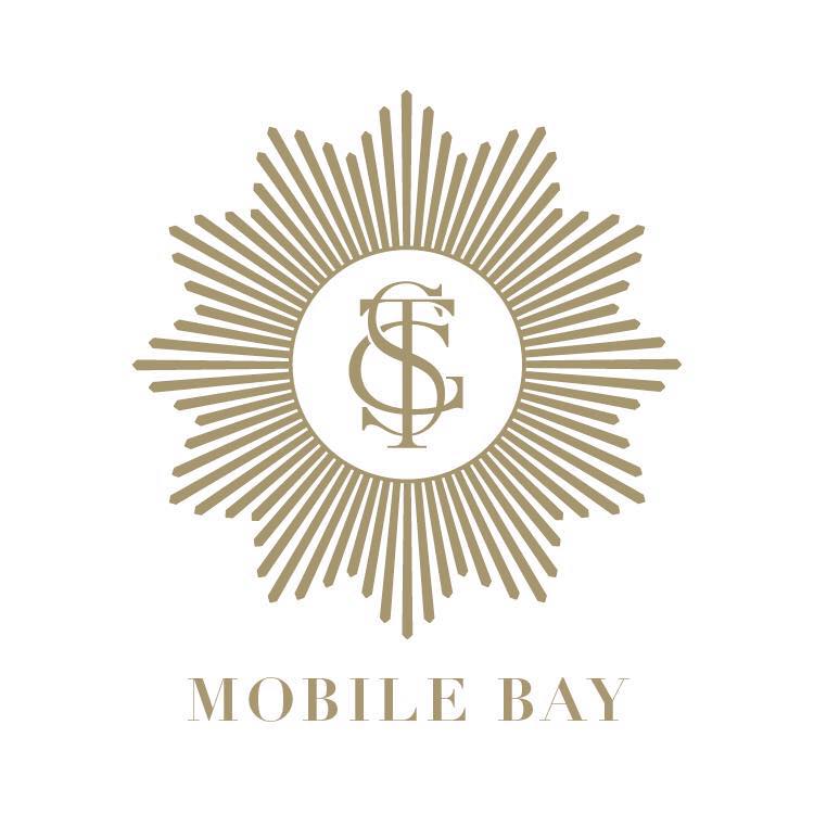 Logo of Scout Guide Mobile Bay with a sunburst design and initials in the center on a white background.